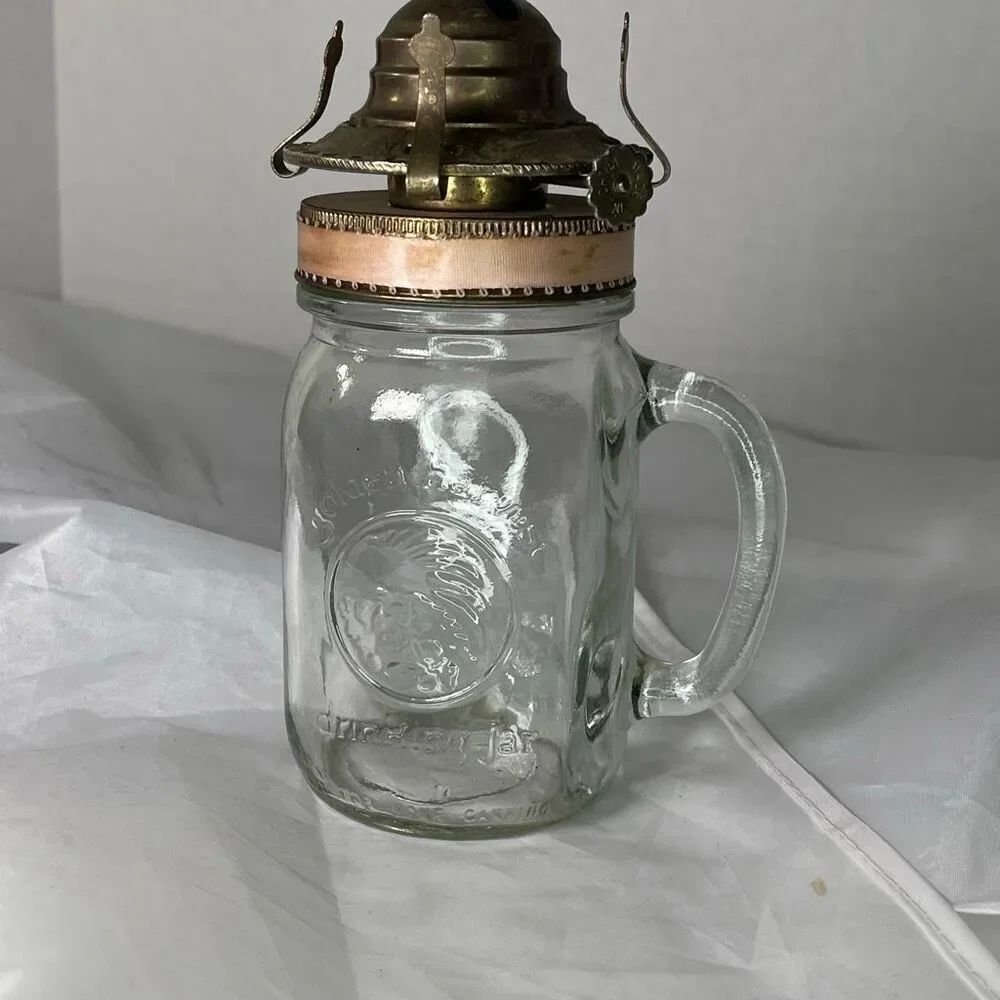 Vintage Golden Harvest drinking jar oil lamp with 2” burner. Pink no wick
